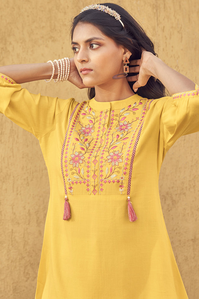 vibrant yellow thread work top