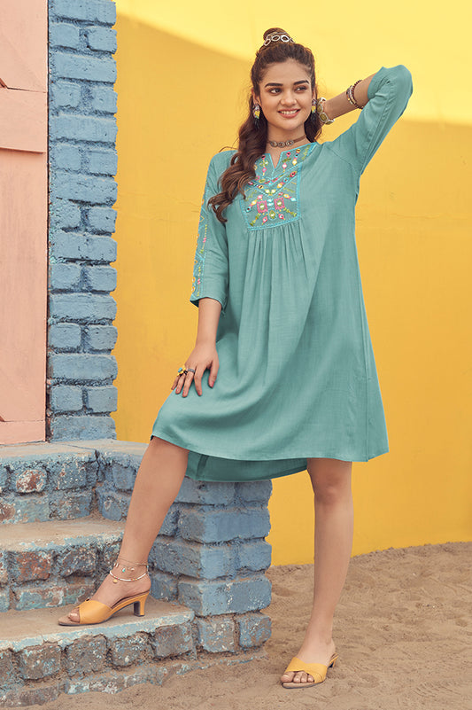 Sea green dress with mirror work