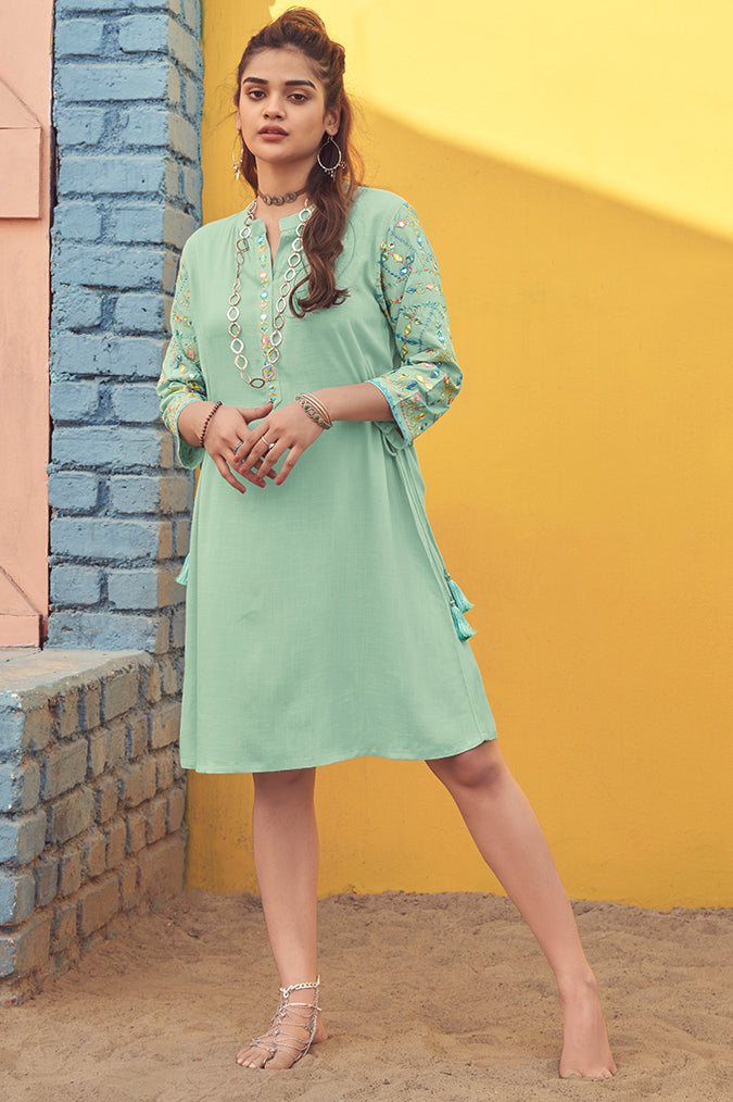 Sea green dress with mirror work