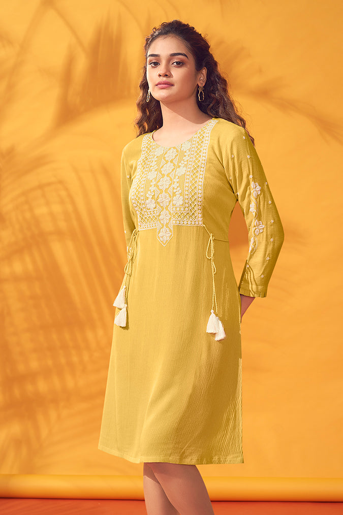 Yellow chiffon dress with thread work